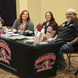 Oklahoma Firefighters Burn Camp representatives at informational booth.