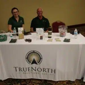 TrueNorth Solutions LLC booth at a conference.